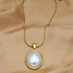 Golden Jewelry Set - Elegant Necklace & Ring Combo With Oval Design